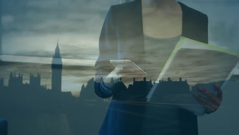 woman using smartphone and cityscape