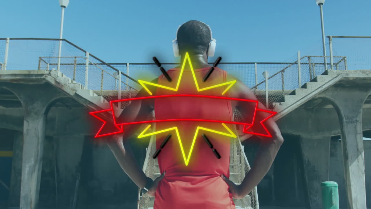 Wearing headphones, athlete standing confidently with starburst animation overlay