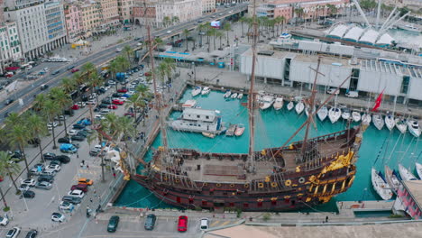 Neptune--anchored-in-Old-Port-of-Genoa;-aerial