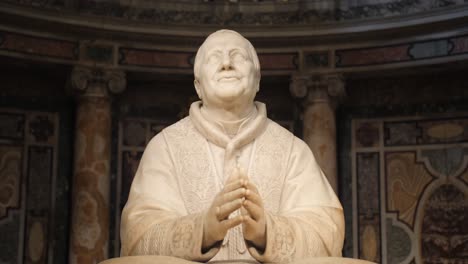 close up of pope pius ix statue in the basilica of saint mary major in rome, italy