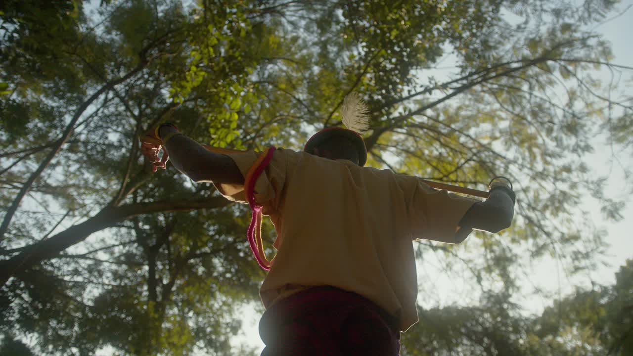 Karamojong Tribal Warrior Standing In The Forest In Uganda, East Africa