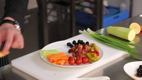 Chef Preparing a Healthy Chicken and Vegetable Platter