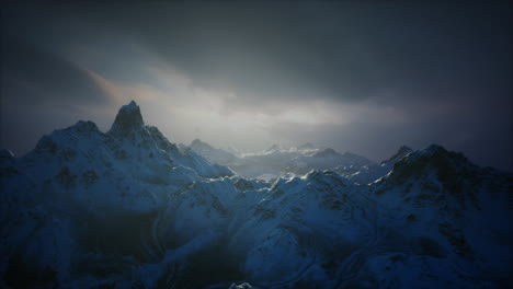 majestic mountain landscape under a cloudy sky during twilight hours