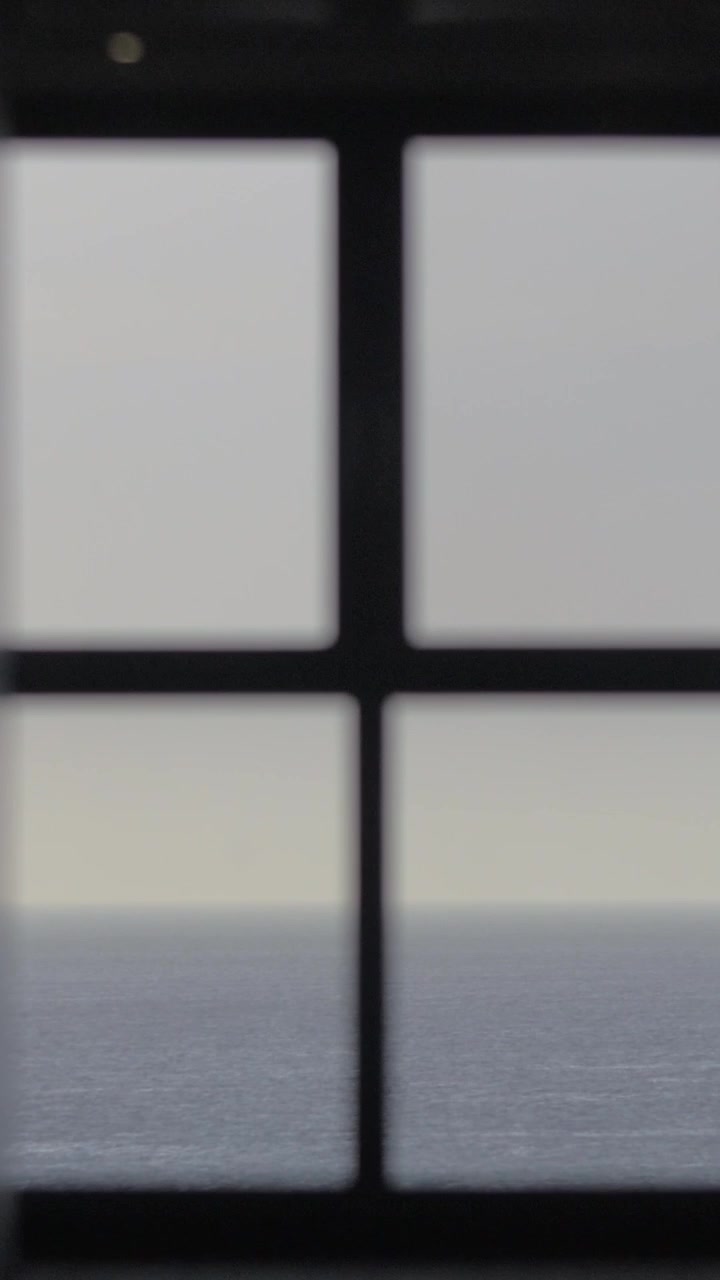 View from the window to blue endless sea