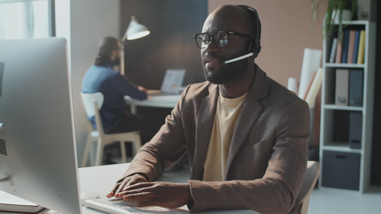 Man Working With Client Online