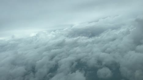 Immersive-Pilot-POV-during-a-real-time-flying-shot-from-the-cockpit-through-a-stormy-sky