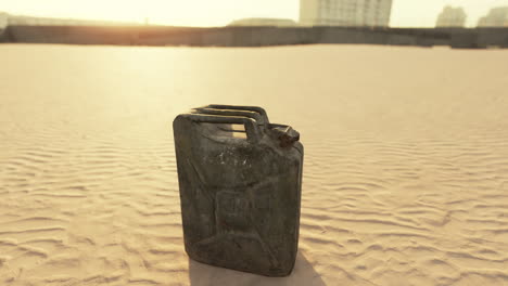 old rusted fuel can on the beach