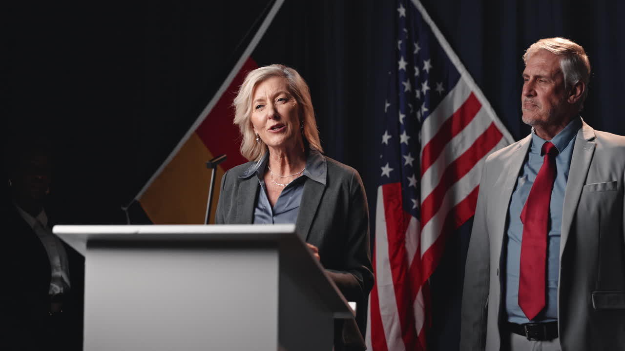 Politicians shaking hands at a political event