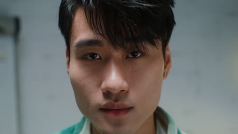 close-up portrait of a young asian man