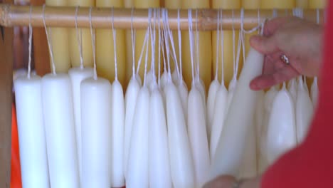 tilt up shot of  bee wax candles