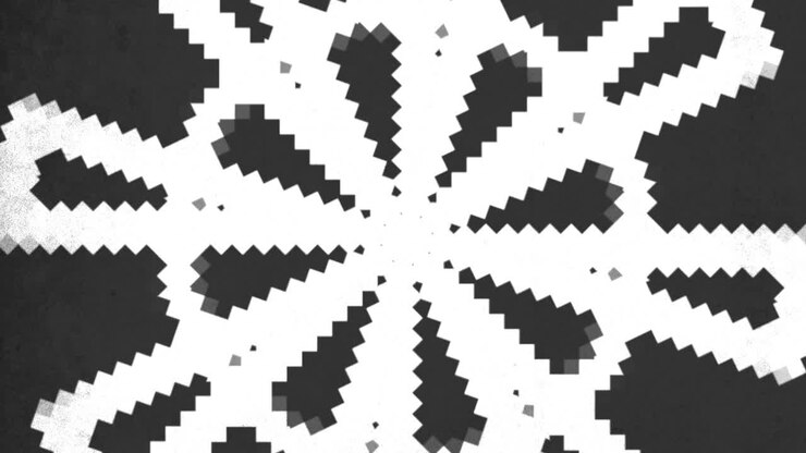 An abstract black and white geometric pattern composed of overlapping triangles in varying sizes, creating a dynamic and visually striking design suitable for decorative purposes
