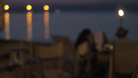 beach cafe with couple in the evening