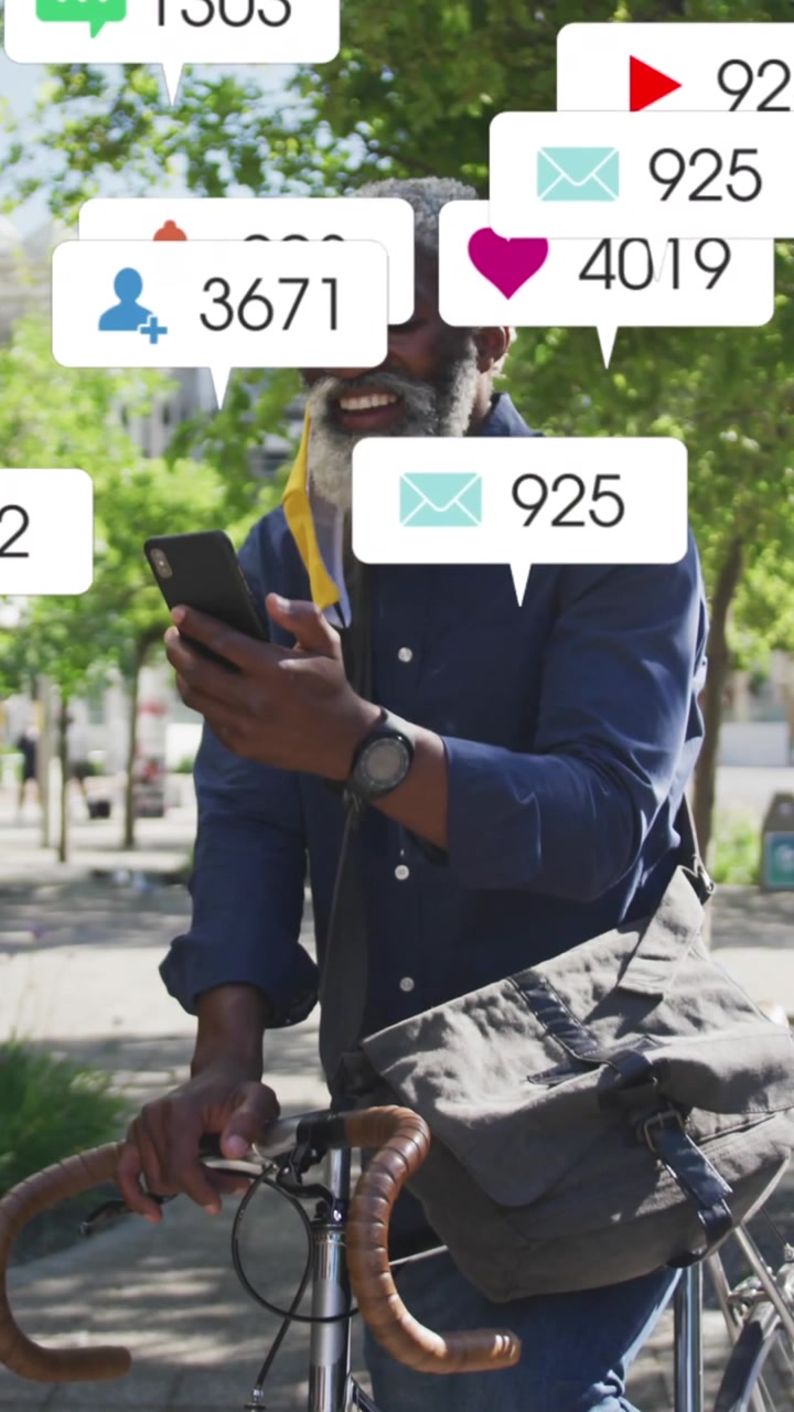 Animation of notification bars, senior african american man on bicycle talking on video call