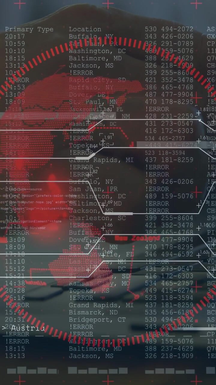 Vertical video: Man typing on laptop and showing red globe over keys, logs scrolling tracking tech