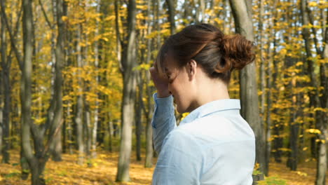 woman in autumn park. outdoors portrait of beautiful young woman in autumn park