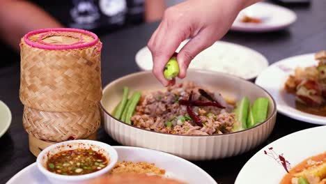 preparing a meal with fresh lime juice