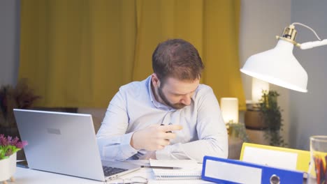 home office worker sprays perfume on man.