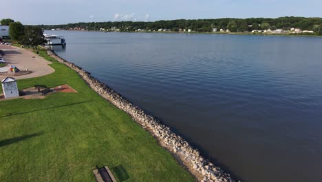 a drone shot drifting over the shoreline of the mississippi river looking north