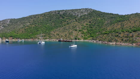 aerial: slow panning drone shot of peristera island shipwreck near alonnisos, sporades, greece during summer