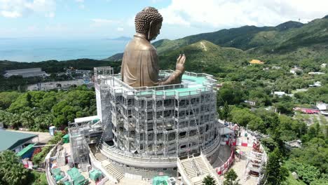 hong kong nong ping big buddha and surrounding lush green environment, aerial view