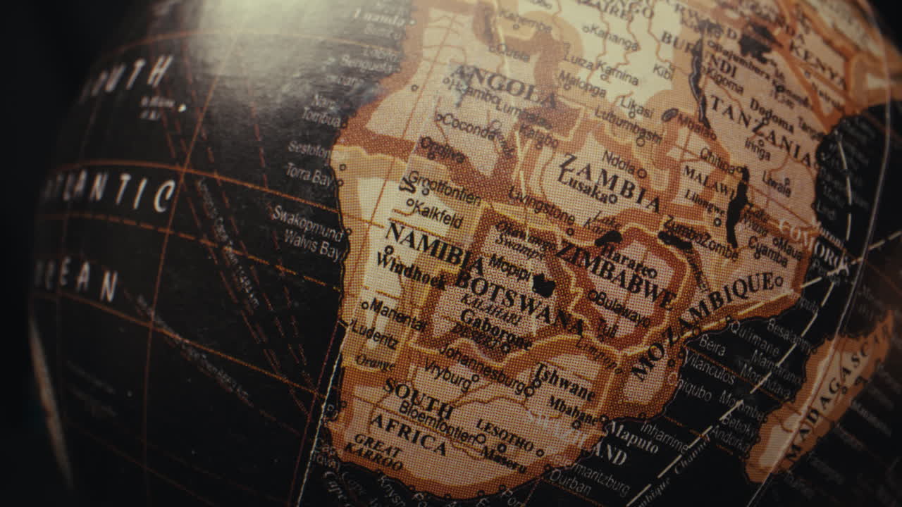 Close-up of a vintage world globe, focusing on Africa