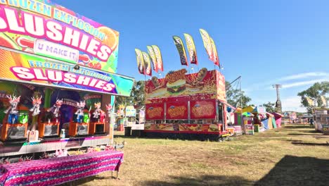 colorful slushy stand at outdoor fair