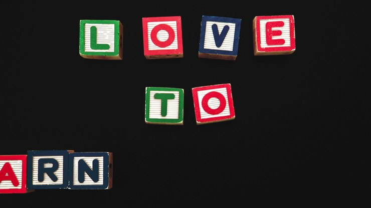Messaggio 'Amo imparare' che appare a blocchi