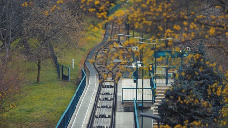 A-cable-car-railway-on-Prague-Petrin-Hill-Park-framed-by-the-trees