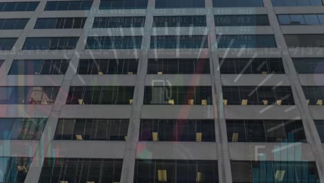 animation of financial graphs and data over office building
