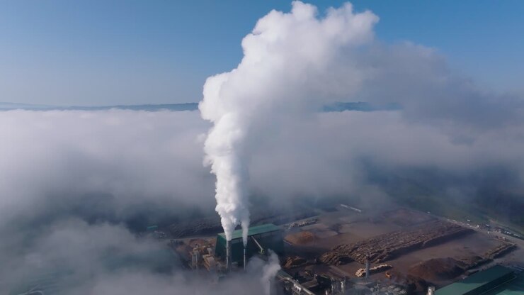 Heavy Smoke Pouring From Factory - Aerial Drone Shot