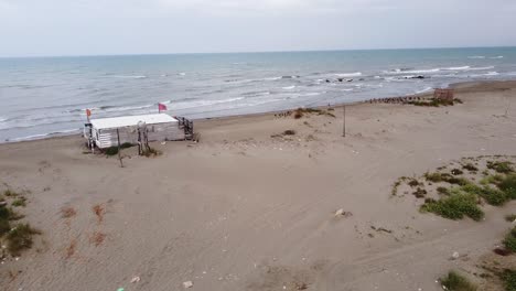 Camper-Van-at-Sandy-Beach-in-Albania,-Aerial-Drone-View