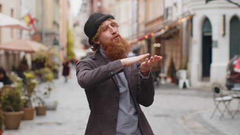 cheerful rich man showing wasting throwing money win lottery share celebrate in city street