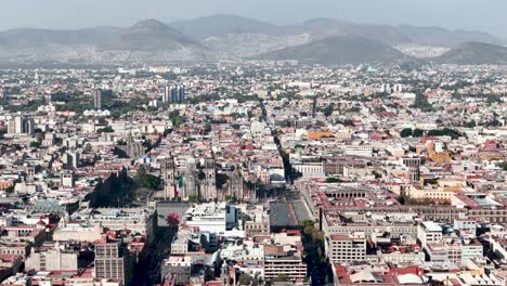 drone shot of downtown mexico city and national palace