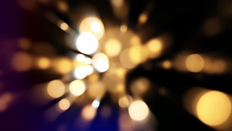 blured bokeh burst with multicolored light leaks on black background. 4k looped golden bokeh flare burst lighting lamp rays effect. abstract background for celebration with light and shine in center.