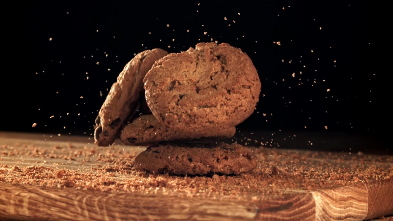 Delicious Chocolate Chip Cookies Falling and Stacking in Slow Motion
