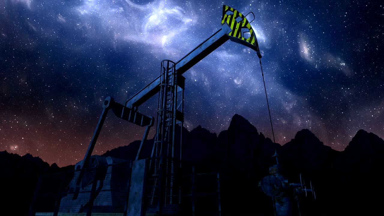 jack de la bomba de aceite bajo el cielo nocturno