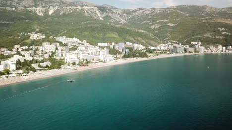 aerial-panoramic-view-of-Montenegro-beach-resort-town-in-becici-budva-town-with-Adriatic-Sea-seascape