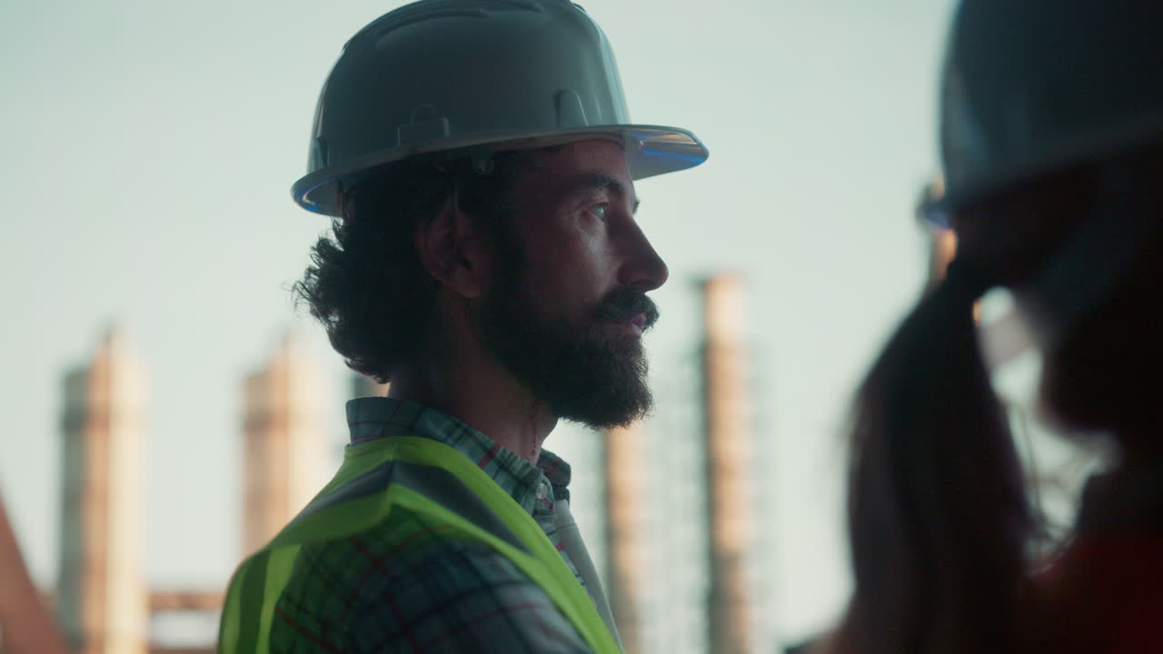 Industrial Worker in Safety Gear at Construction Site