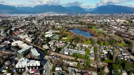 trout lake and residential houses in the neighborhood in bc, canada