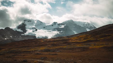 Dramatic-Snow-Peaked-Mountain-Fast-Clouds