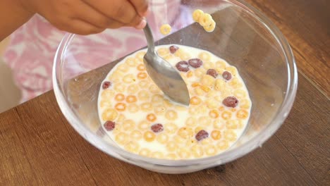 child eating breakfast cereal