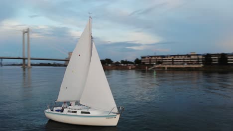 aerial tracking shot of a traditional sailing boat on the upper columbia river