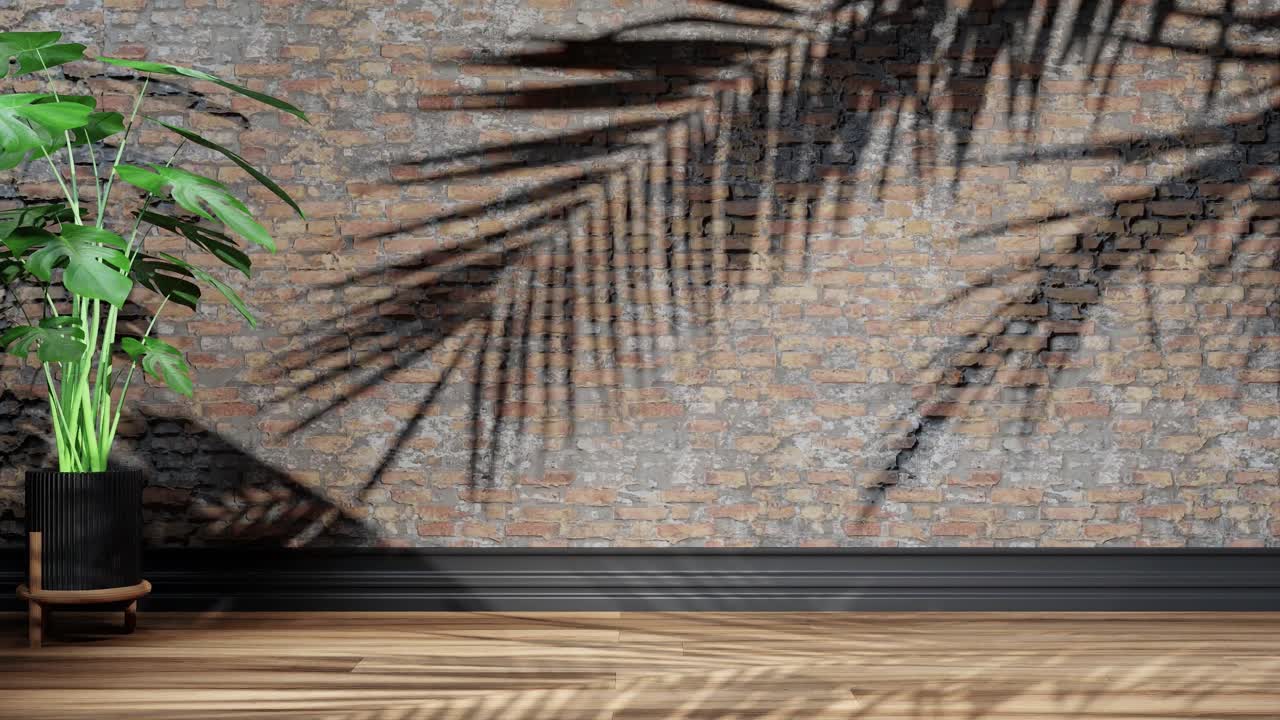 juego de sombras tropicales en la pared de ladrillo urbana