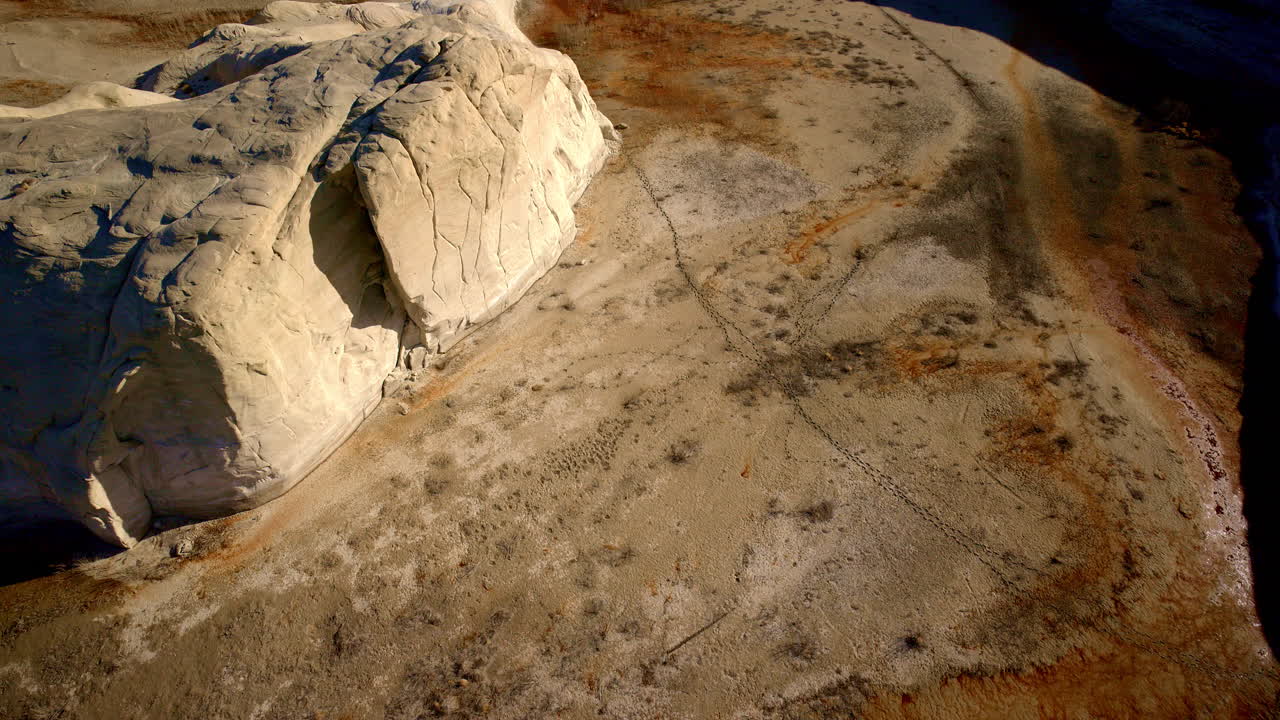 A breathtaking drone sweep over the vibrant toadstool hoodoos, showcasing surreal rock formations.