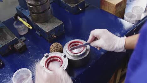 Mixed-race-man-working-in-factory