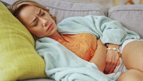 Sick-woman,-stomach-and-pain-in-house-for-ibs