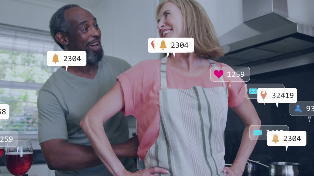 Couple hugging in kitchen, receiving social media notification tracking floating engagement metrics