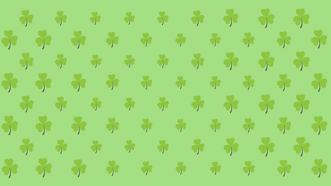 Animazione digitale di molteplici foglie di trifoglio che si muovono su sfondo verde.
