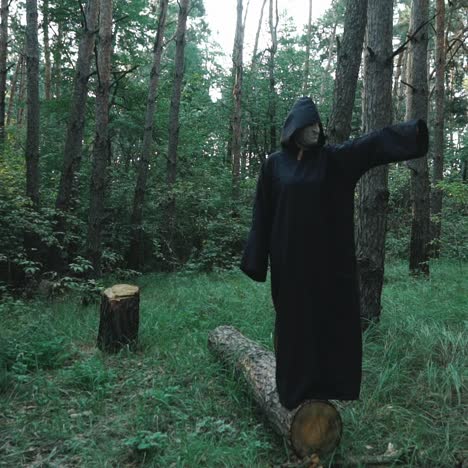 terrible monster in dark spooky forest. halloween costume