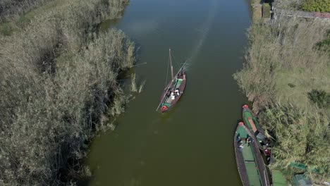 scenic canal boat tour through a lagoon landscape